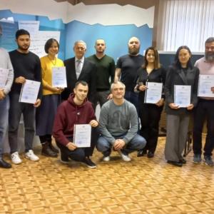 Group photo with certificates