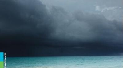 Cover of the "State of the Climate in Latin America and the Caribbean 2022" report, showing a stormy sky over a beach with the World Meteorological Organization logo.