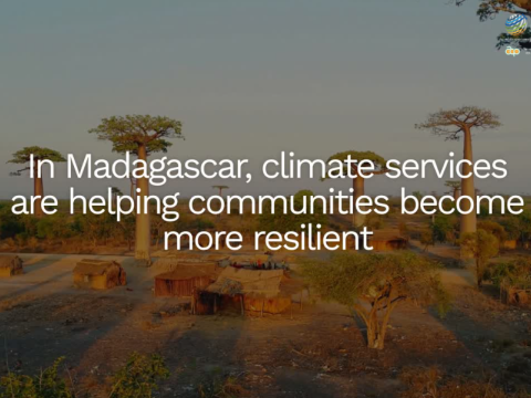A rural village in Madagascar with large baobab trees and huts, overlaid with text about climate services helping communities become more resilient.