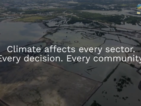 Aerial view of flooded land with text overlay: "Climate affects every sector. Every decision. Every community." ClimSA logos are visible in the top right corner.